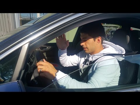 Luis Suarez Leaving Barcelona Training Ground and Signing Autographs From his Car