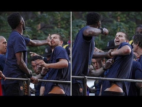 Barcelona's Gerard Pique and Alex Song brawl on opentop bus after winning Spanish title.