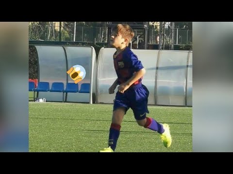 Thiago Messi playing football at Barcelona training ground