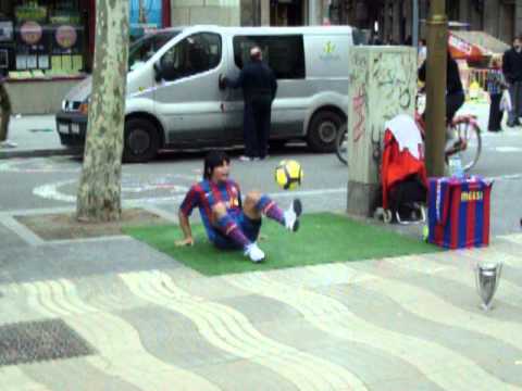 Lionel Messi Performs On The Streets Of Barcelona La Rambla